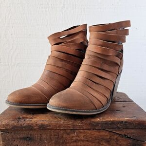 Free People boots distressed strappy leather.